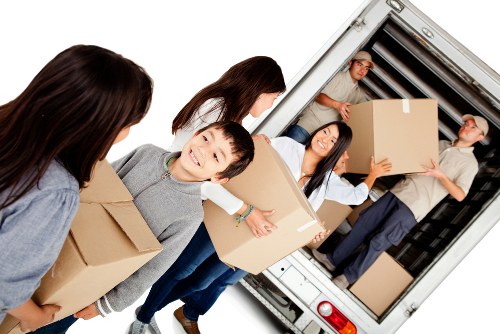 Removal van loading furniture near Swiss Cottage residential streets