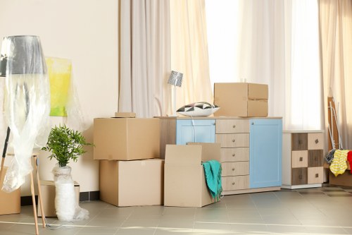 Removal team planning a flat move in Swiss Cottage near local apartment buildings