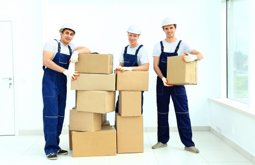 Careful unloading and placement during a Swiss Cottage move