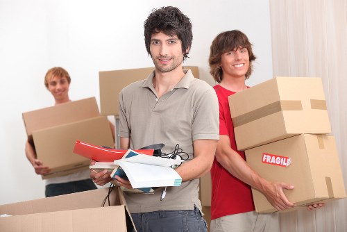 Local moving crew loading items for a removal service in Swiss Cottage