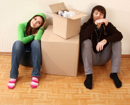 Loading furniture into a van during a Swiss Cottage relocation