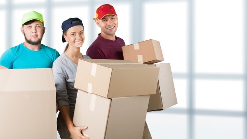 Removal van being loaded for a domestic relocation in Swiss Cottage