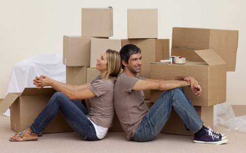 Helper moving office or home items with a van in Swiss Cottage