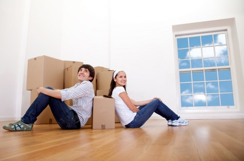 Packed boxes and furniture ready for a local removal job