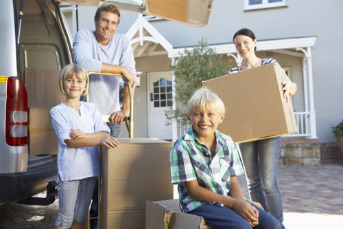 Careful loading of household furniture near Swiss Cottage apartments