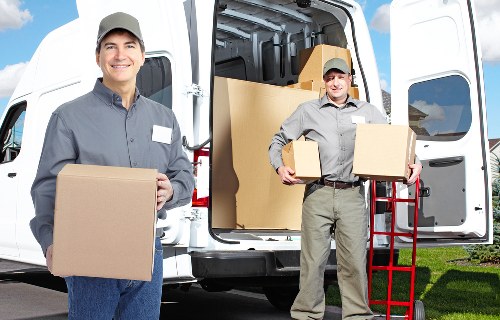 Careful handling of boxes and furniture on a Swiss Cottage moving day