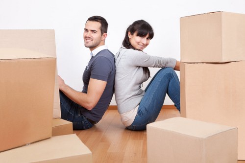 Commercial moving team handling office furniture and equipment
