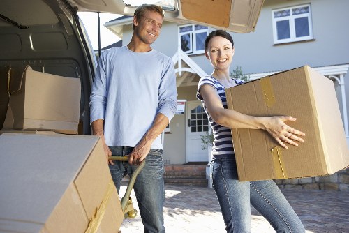 Assorted packing materials including bubble wrap, tape, and boxes for local relocation